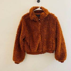 Sherpa puffy rust colored zip up jacket